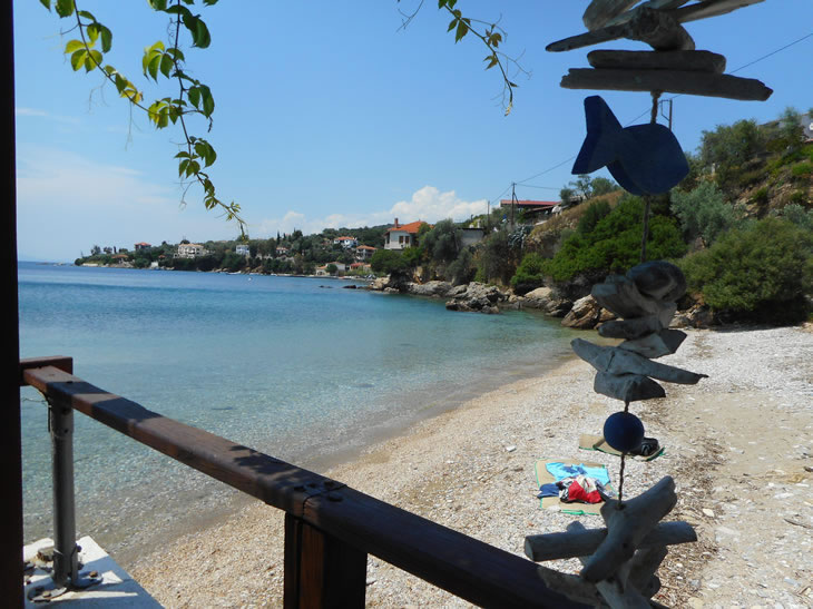 Early summer view of a beach in HORTO near PERIGIALI Estiatorio, still quiet ...